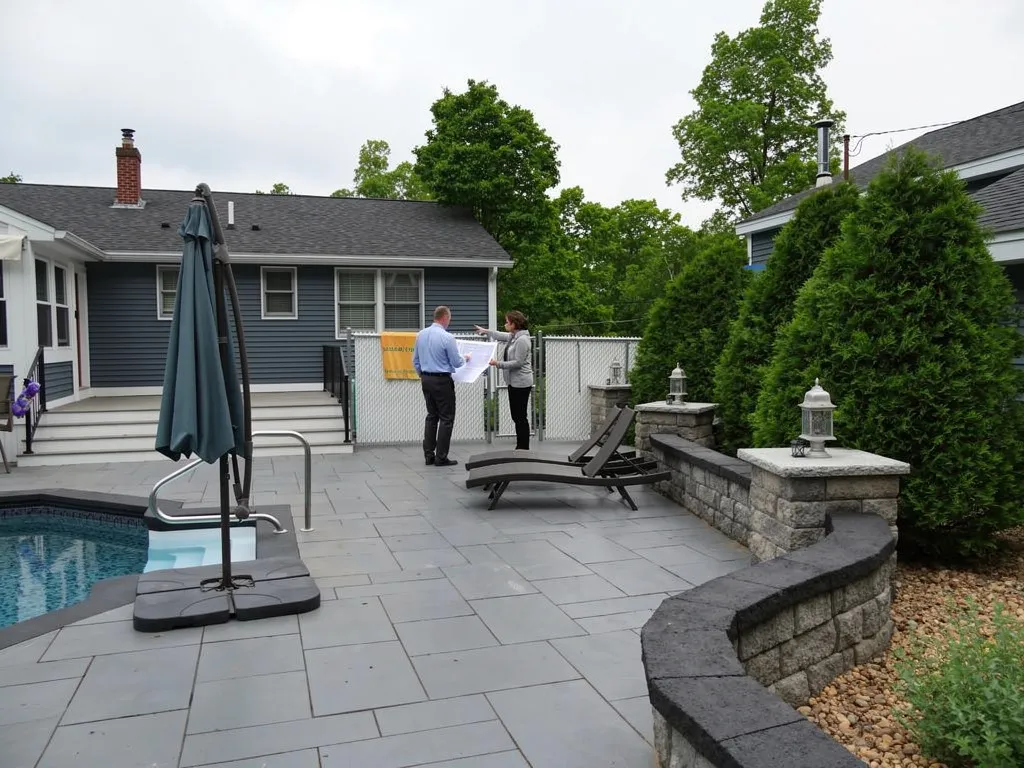 What are the local regulations and permits required for patio construction
