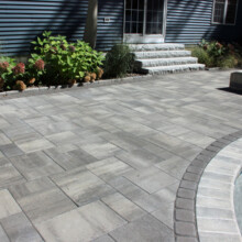 Pool patio design in multiple sized pavers