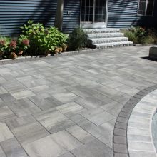 Pool patio design in multiple sized pavers