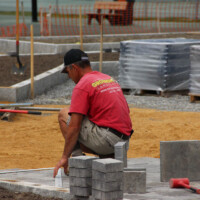 groundhog hardscape crew installing patio at Griffin Park in Windham NH