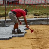 Hardscape Crew Installing Pavers