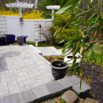 Paver patio and walkway design by Groundhog Landscaping in Derry, NH.